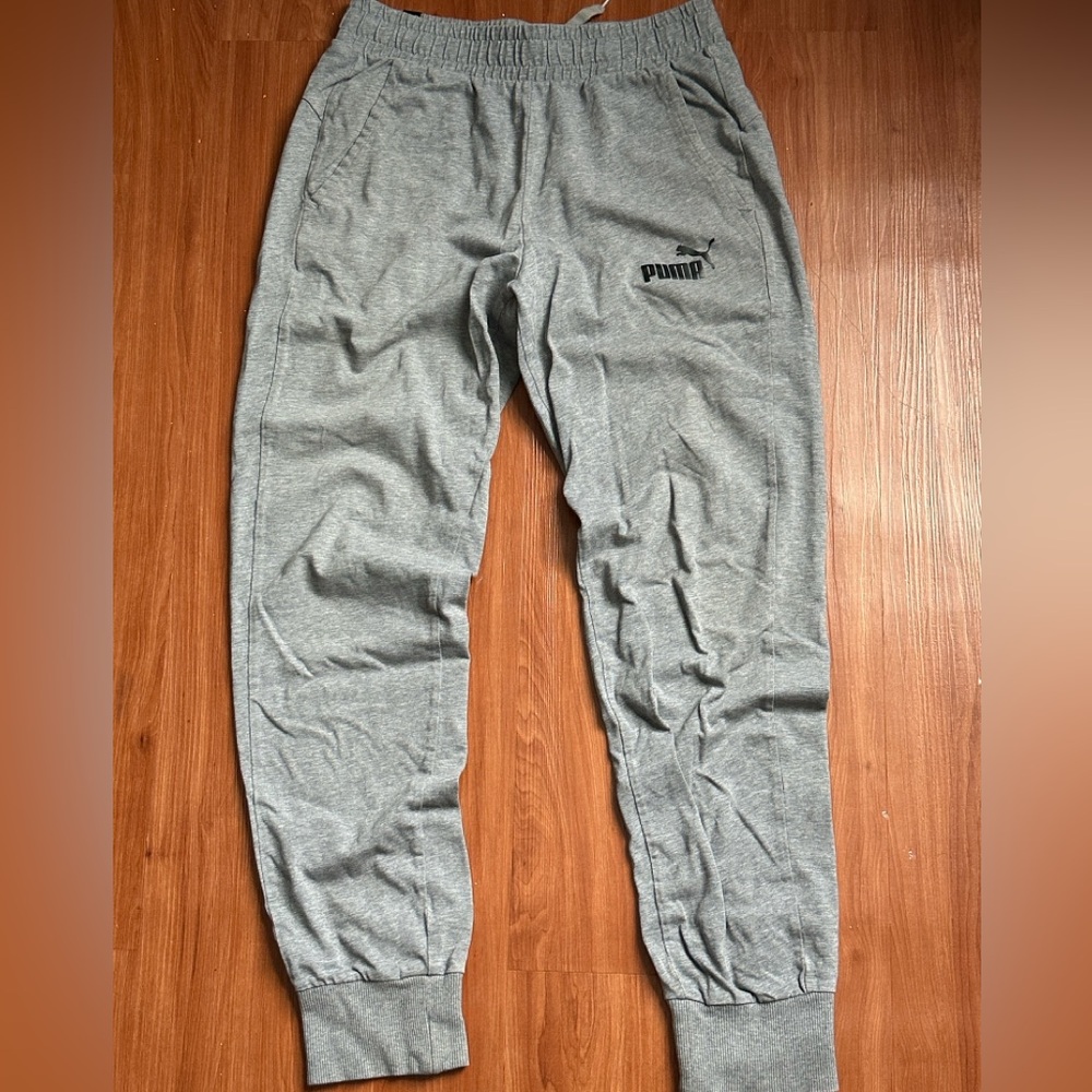Elevate your street style with these sleek black streetwear pants